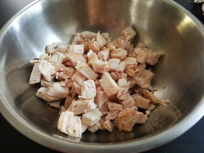 chopped chicken in a mixing bowl