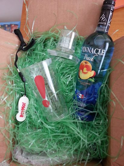 BevMo Box with a shaker glass and a bottle of Pinnacle peach
