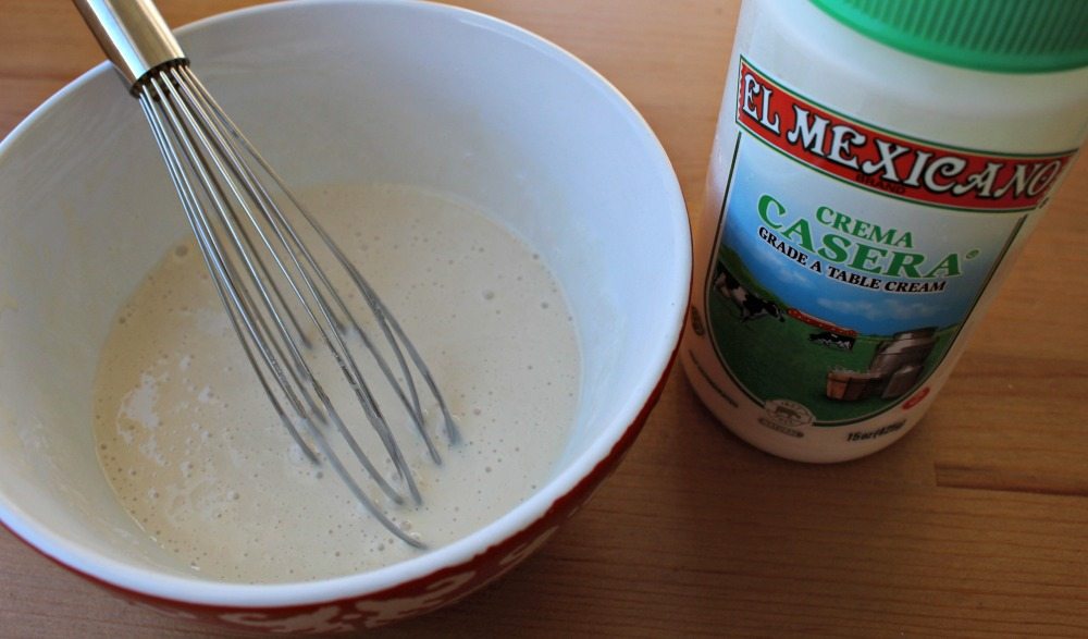 Crema Mexicana in bowl with whisk