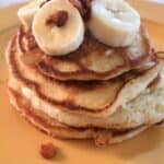 Banana Bacon Pancakes is a mix of savory and sweet. This fluffy breakfast will make you swoon. Enjoy! by Mama Maggie's Kitchen