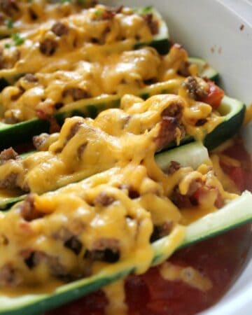 Taco Stuffed Zucchini - A simple, low carb, diabetic-friendly, low fat, and 100% delicious recipe that everyone will love. by Mama Maggie's Kitchen