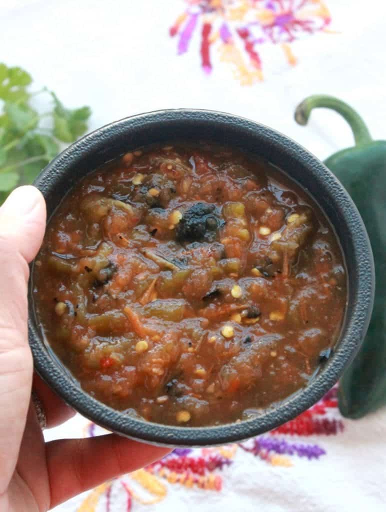 Roasted Tomato Salsa is a spicy and delicious topping for any of your Mexican food favorites. by Mama Maggie's Kitchen
