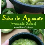 Hand holding a bowl of Salsa de Aguacate, or Avocado Salsa, surrounded by jalapeno slices and avocado wedges