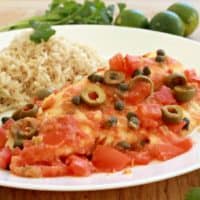 Pescado a la Veracruzana, or Veracruz-Style Fish, is a savory dish that will blow your tastebuds away. It’s not very spicy with delicious bites of olive and briny capers. Enjoy! By Mama Maggie’s Kitchen