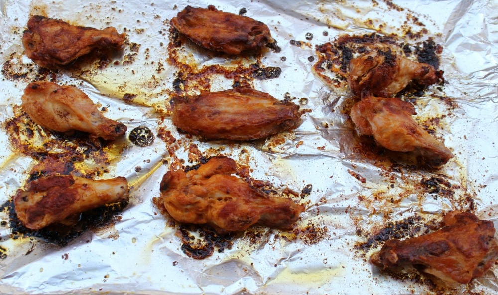 Baked Chicken Wings on foil-covered baking sheet.