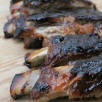 Grilled Ribs with Tamarind BBQ Sauce are full of bold, sweet, and spicy flavors. They scream summer fun by the grill. By Mama Maggie's Kitchen