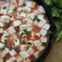 Queso Panela en Salsa Roja, or Panela Cheese in Mexican Red Salsa, is a delicious appetizer that also makes a great light meal. Creamy and not too spicy. By Mama Maggie’s Kitchen