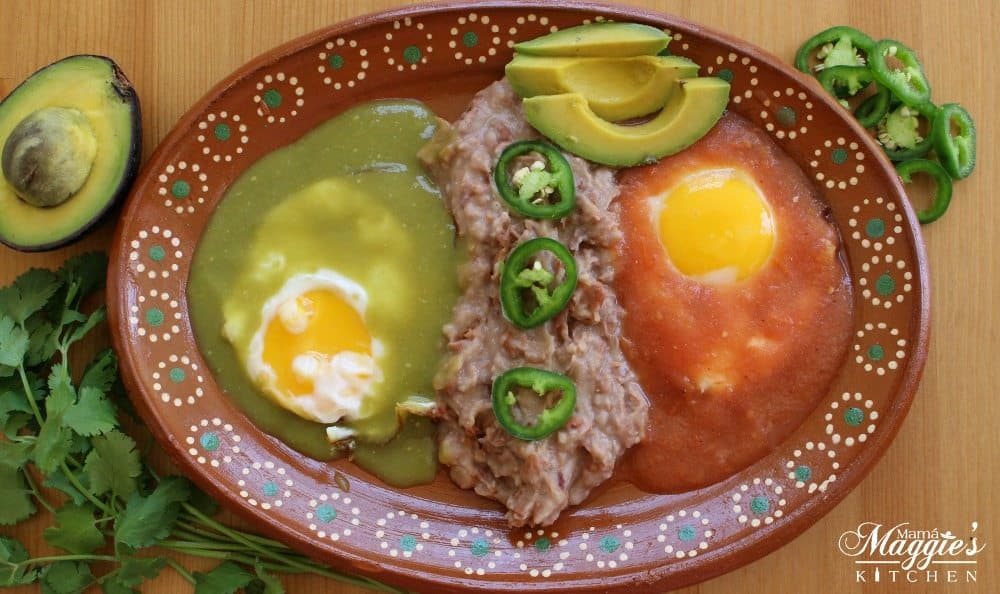 Divorced Eggs (or Huevos Divorciados) served on a decorative Mexican terra cotta clay plate. 