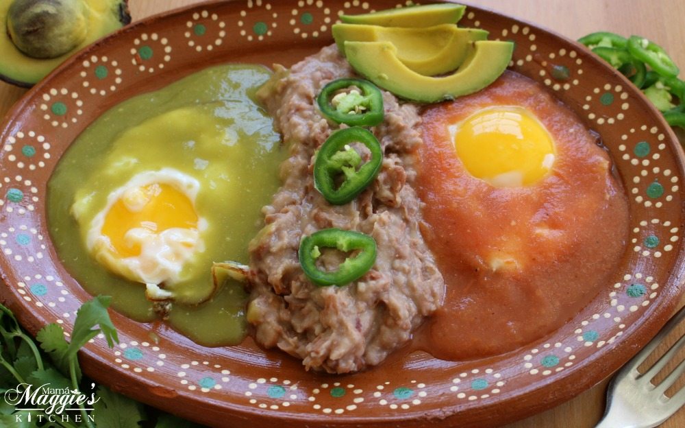 Huevos Divorciados served on a decorative Mexican terra cotta clay plate.