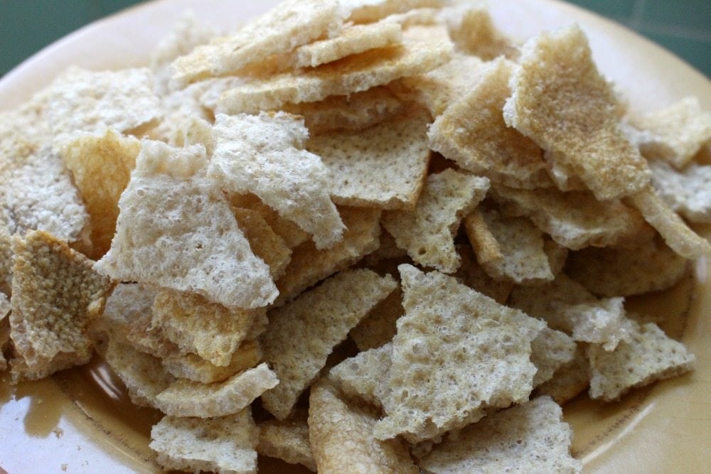 Pieces of pork cracklings on a plate