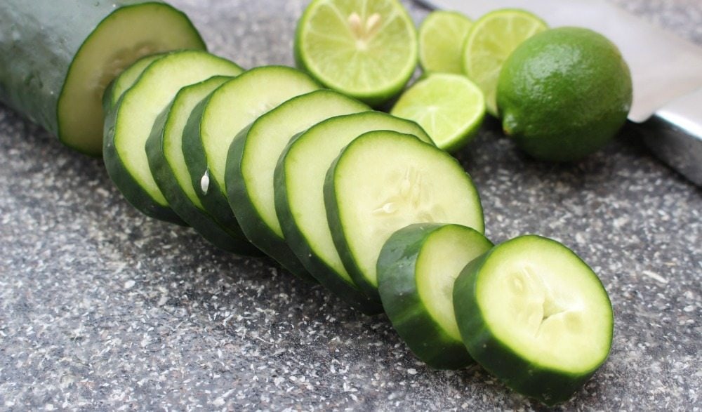 Cucumber slices on a granite countertop. 