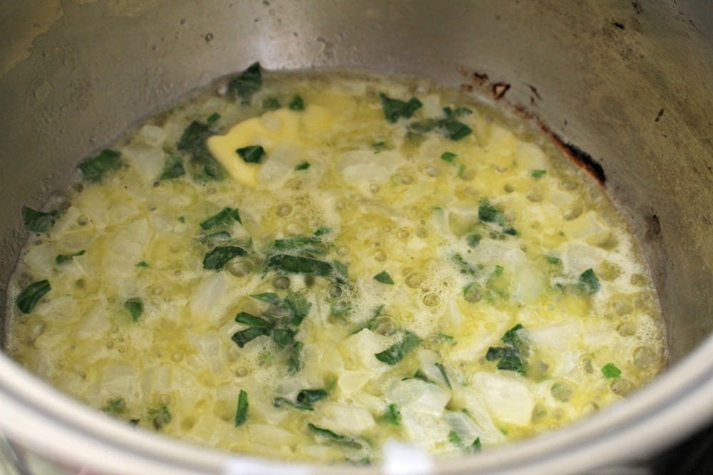 Butter Onion Epazote cooking in a stock pot