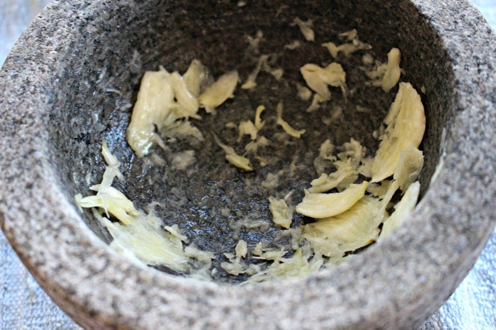 Crushed garlic in a molcajete. 