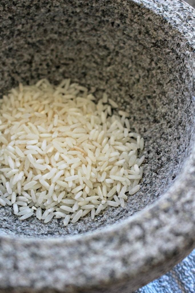 Rice inside the bowl of a molcajete. 