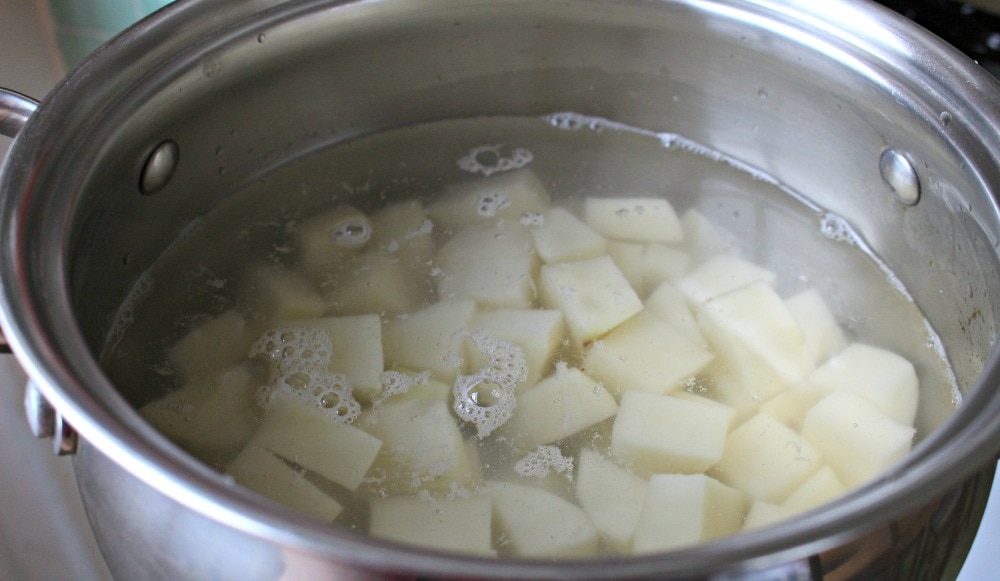 Diced potatoes in water in a stock pot