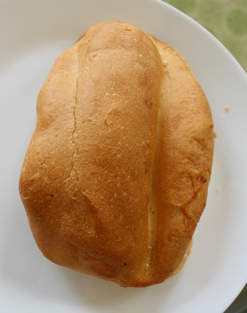 Mexican telera bread on a white plate