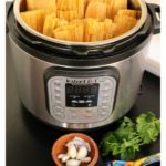 Instant Pot Pork Tamales are incredibly tasty and perfect for your next fiesta. This authentic Mexican recipe is ready in almost half the time. Serve your favorite salsa and enjoy! Recipe with VIDEO. By Mama Maggie's Kitchen