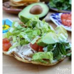 Tostadas de Pollo (Chicken Tostadas) are a great way to use up leftovers. Mexican food that's easy-to-make and delicious to taste.