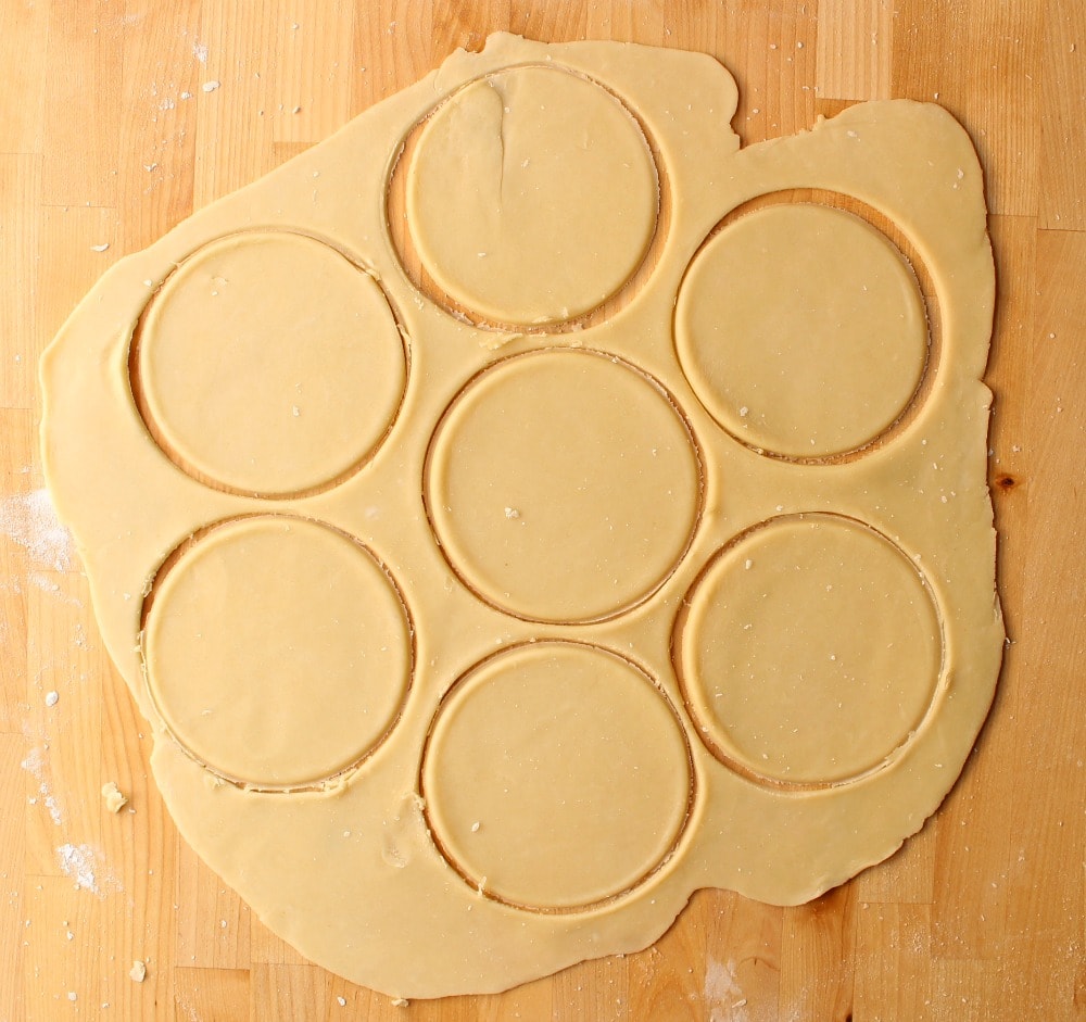 Circles cut out of pie dough. 