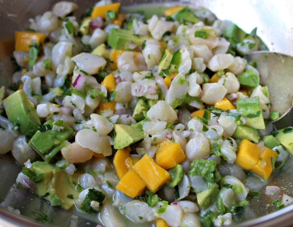 Scallop Ceviche mixed and in a bowl marinating.