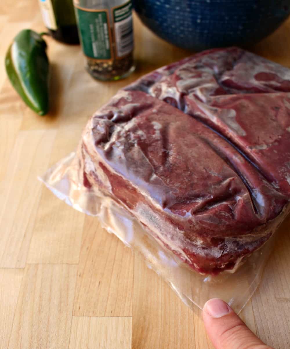 Finger pointing to the sealed liver package. 