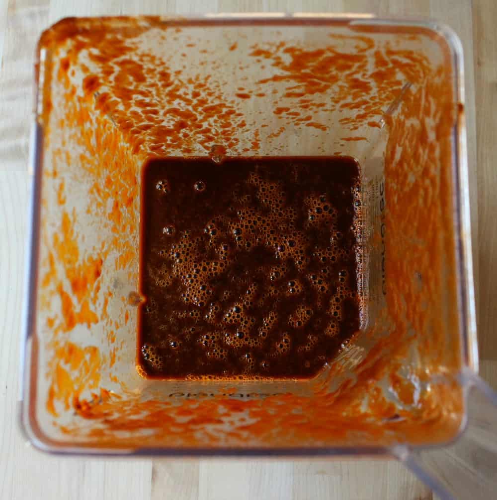 Red adobo sauce in blender.