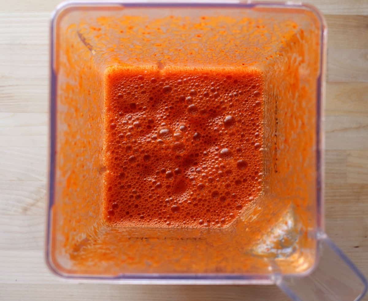 Red chile guajillo sauce in a blender.