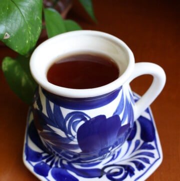 Anti inflammatory tea in a decorative blue mug.