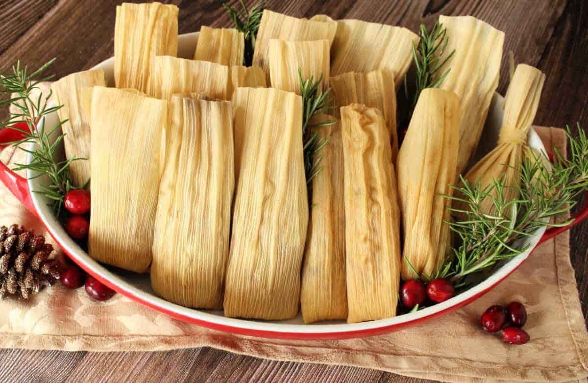Instant Pot Chicken Tamales Served in a decorative Christmas platter.