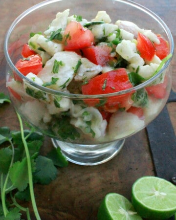 Fish ceviche served in a glass bowl.