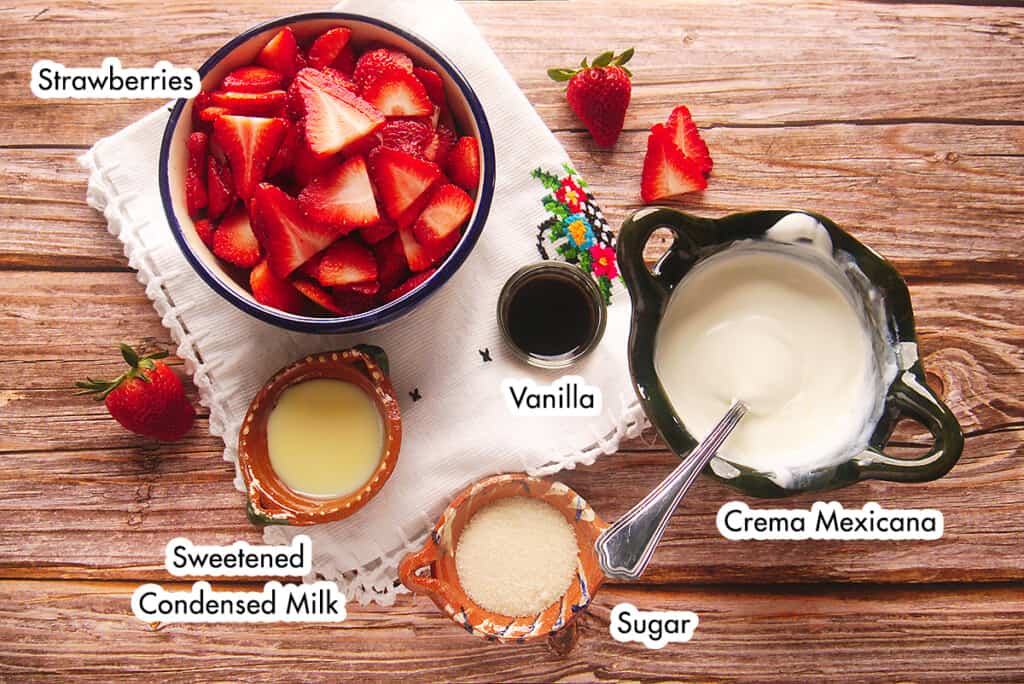 The ingredients for Fresas con Crema laid out and labeled.