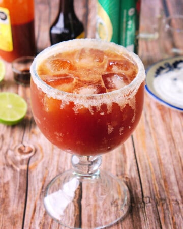A picture of a Mexican Michelada served in an ice cold glass.
