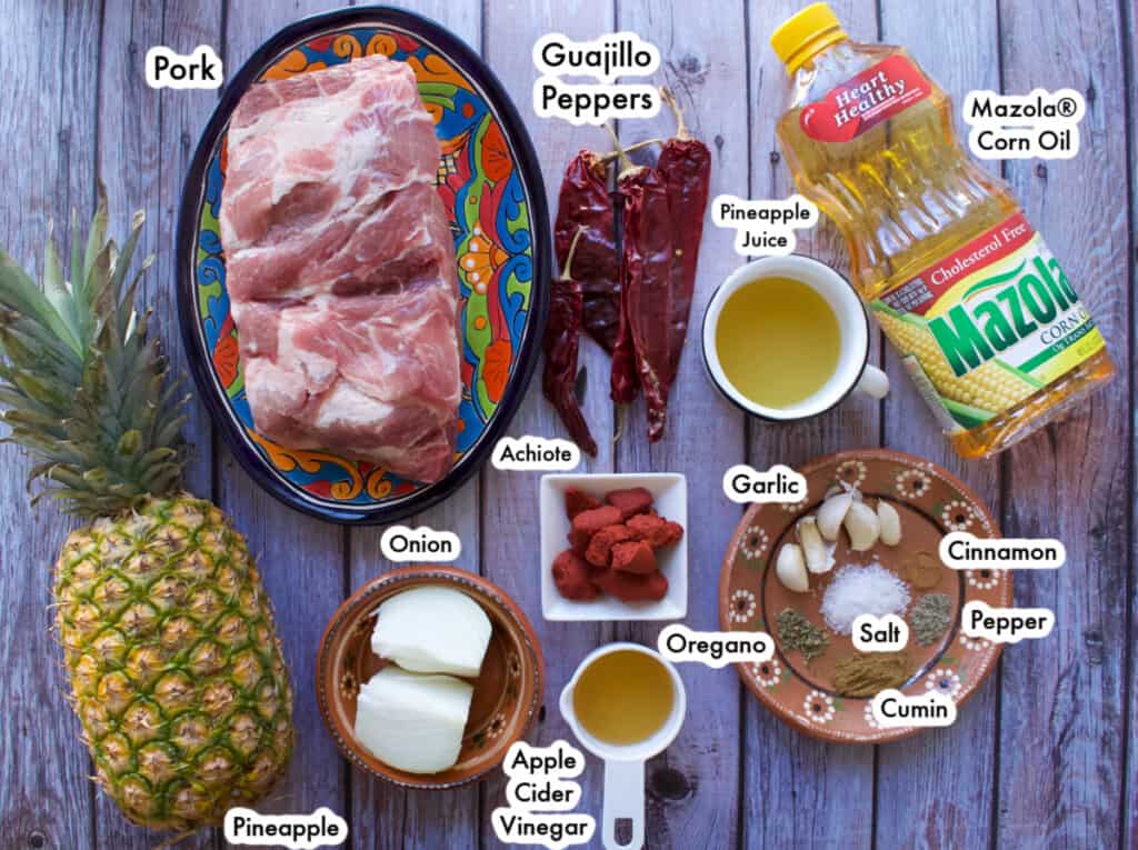 The ingredients needed to make Tacos Al Pastor laid out and labeled.