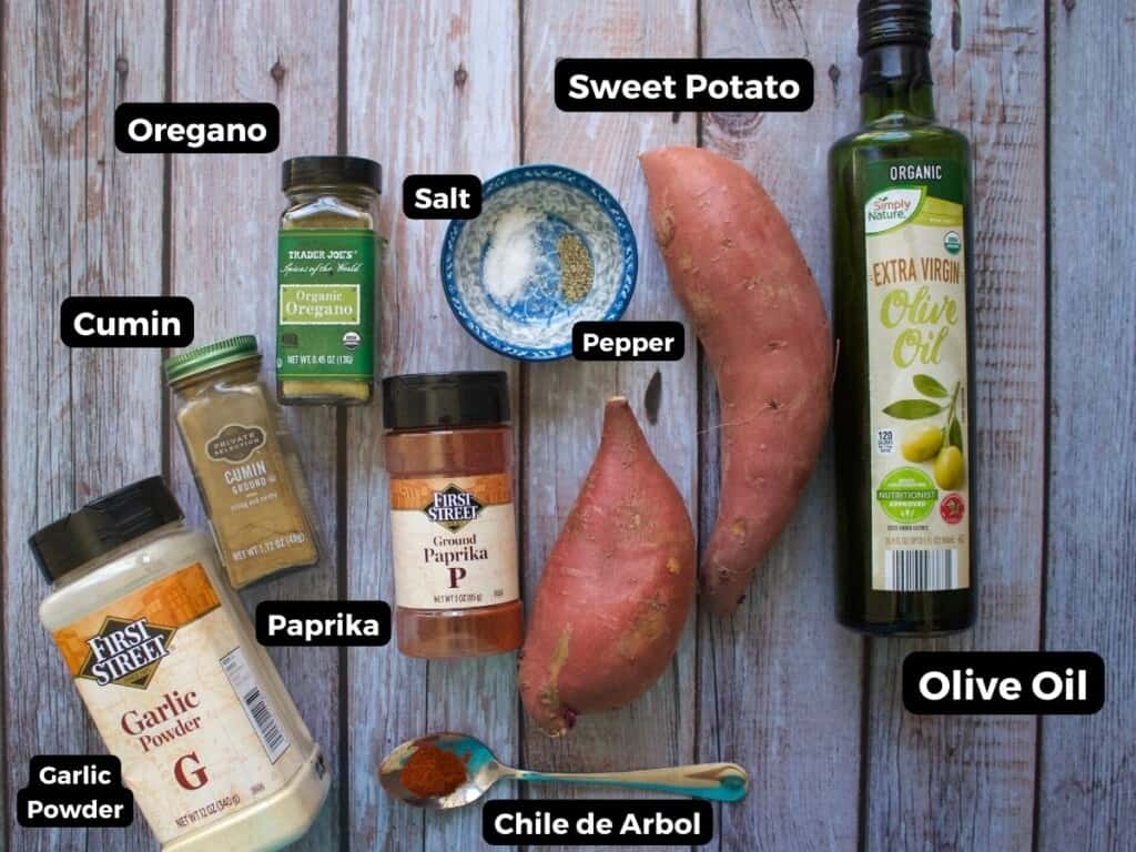 The ingredients needed to make Mexican sweet potatoes laid out and labeled.