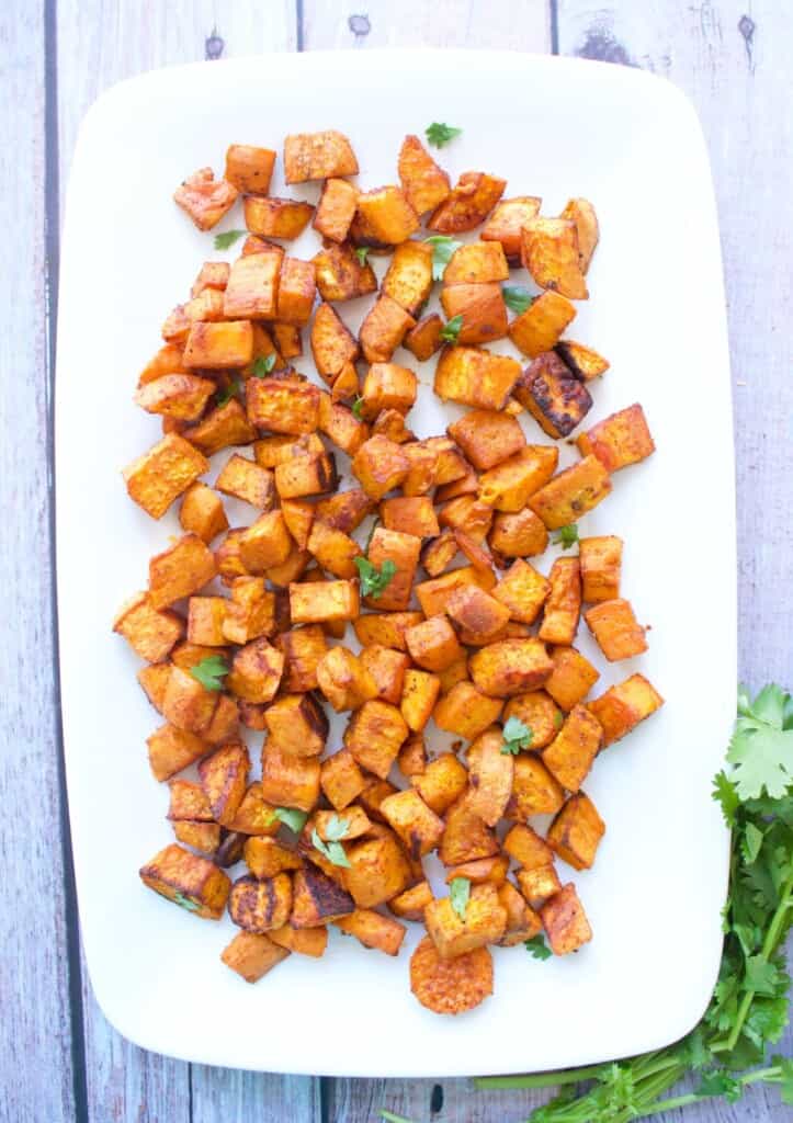 Roasted Mexican Sweet Potatoes served on a white platter.