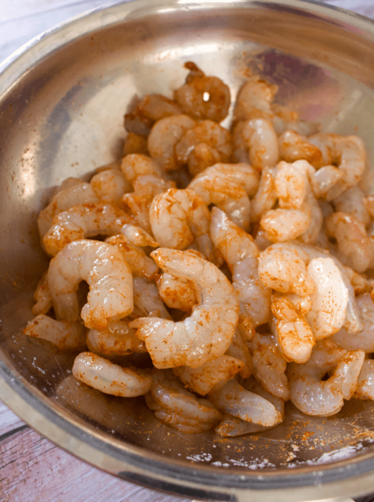 Raw shrimp coated in spices.