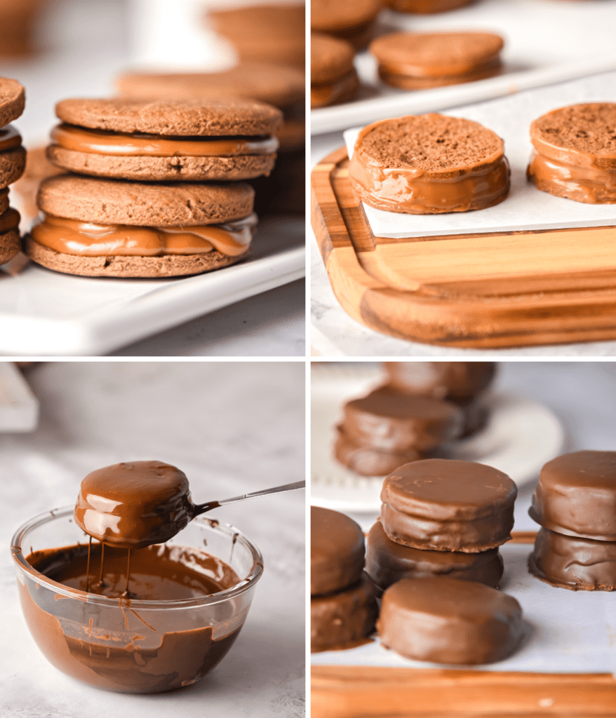 Chocolate cookies filled with dulce de leche getting dunked into melted chocolate.