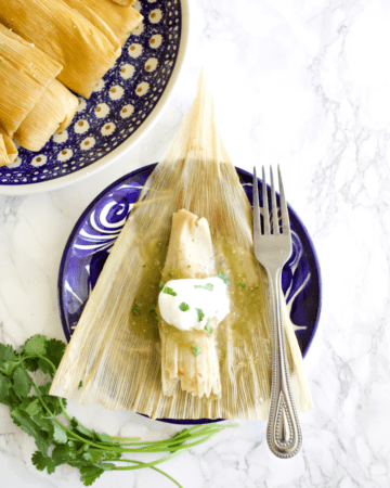 Tamal de Rajas served with Crema Mexicana on top