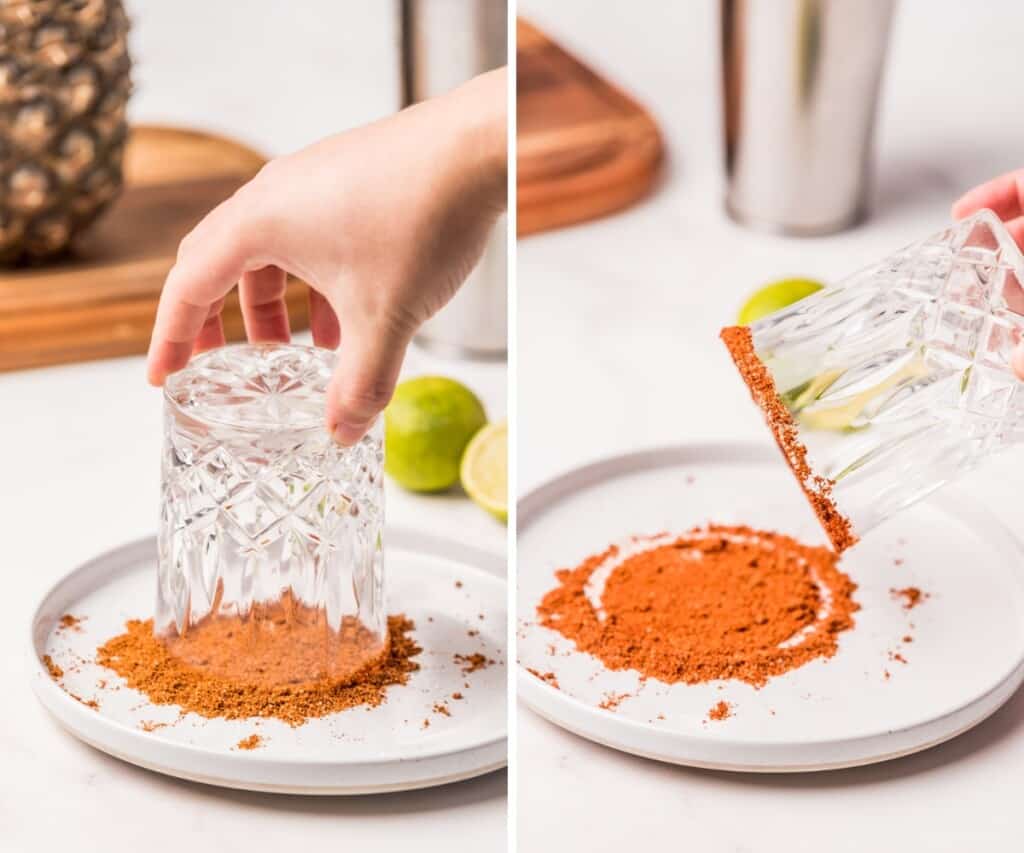 Dipping the glass into the chili powder
