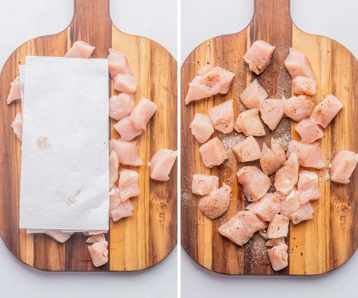 Diced raw chicken on a cutting board.