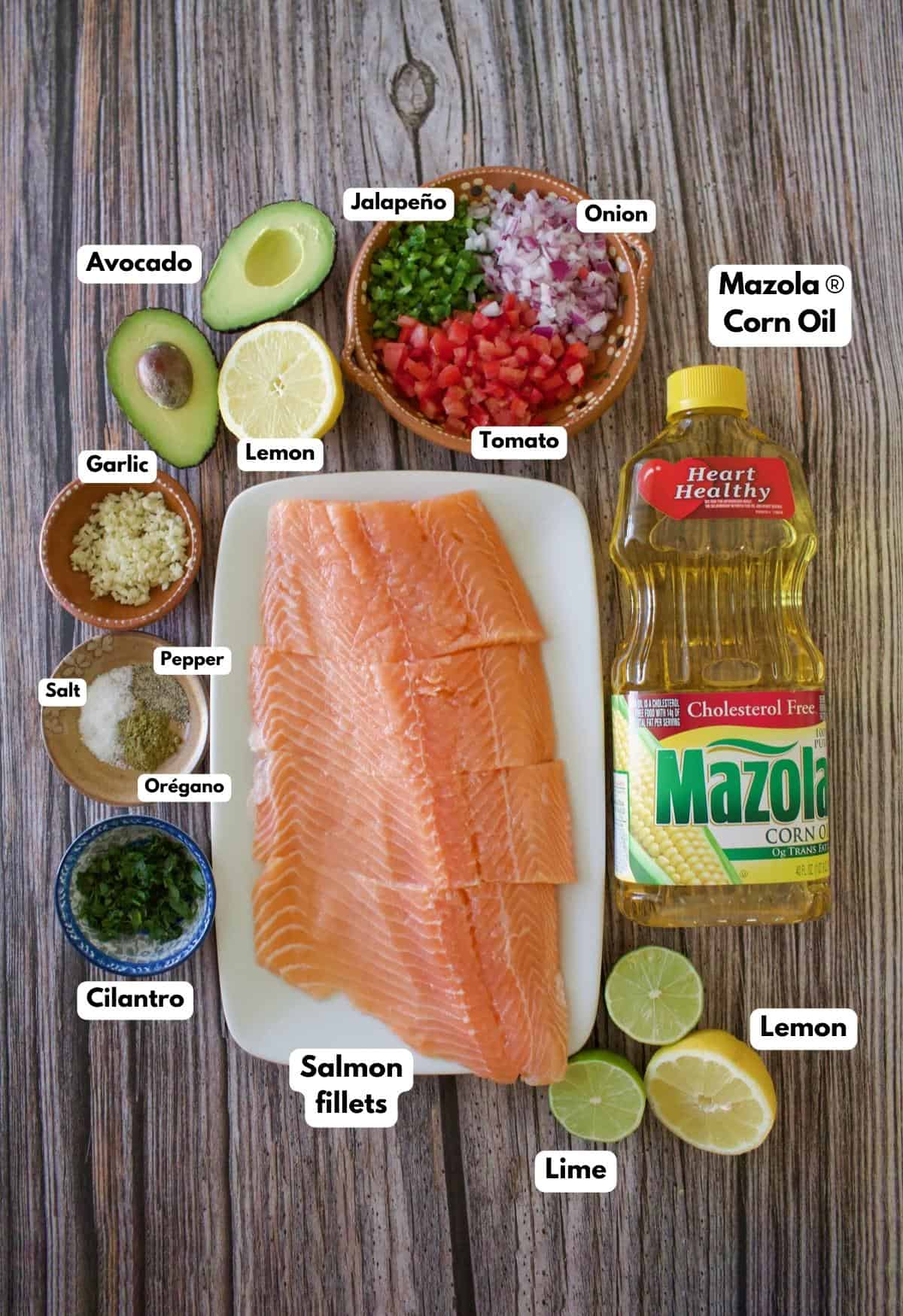 The ingredients needed to make the recipe labeled and sitting on a wooden surface.