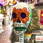 A gigantic skeleton head in a Mexican market.
