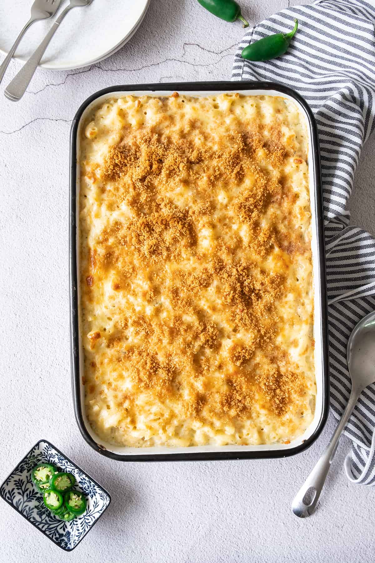 Freshly baked Mexican Mac and Cheese in a baking dish.