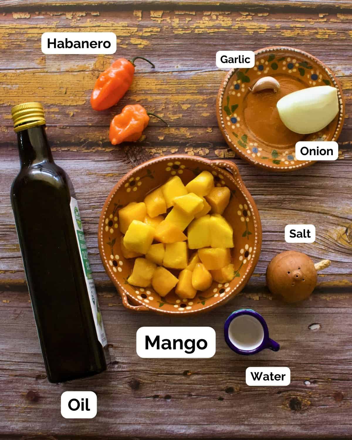 The ingredients needed to make the mango habanero salsa.