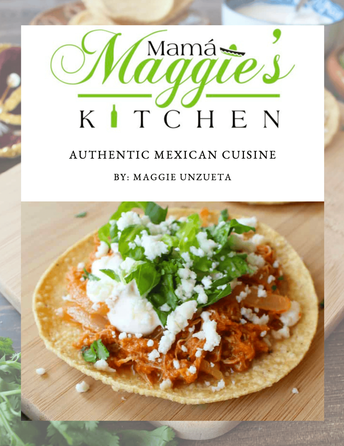 A corn tortilla topped with shredded chicken in red sauce, crumbled cheese, sour cream, chopped onions, and cilantro—just like in Mamá Maggie’s Kitchen cookbooks. Authentic Mexican Cuisine by: Maggie Unzueta.